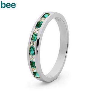 White gold ring with zirconia and synthetic emerald